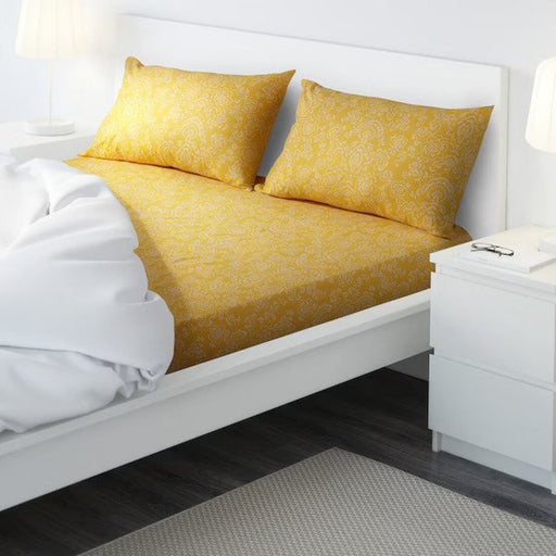 Yellow cotton flat sheet and 2 pillowcase set from IKEA on a bed  30418978
