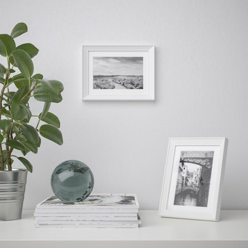 A modern grey photo frame with a minimalist design, ideal for showcasing your art or photography 60427269