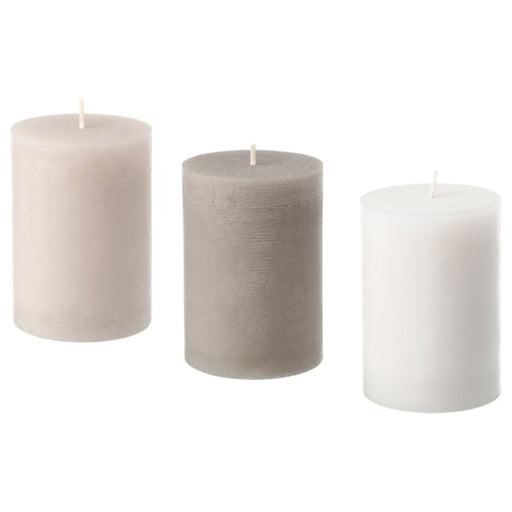 A scented block candle from IKEA, emitting a cozy and inviting fragrance, perfect for relaxing after a long day.