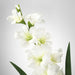 "A close-up of a lifelike IKEA artificial gladiolus flower in a vibrant shade 