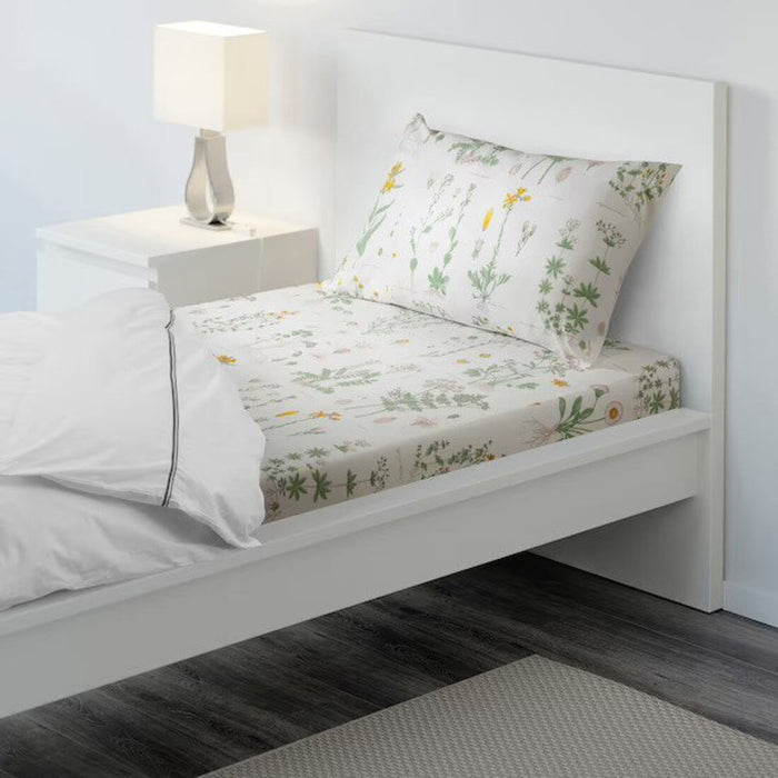 White cotton flat sheet and pillowcase set from IKEA on a bed  60419033 
