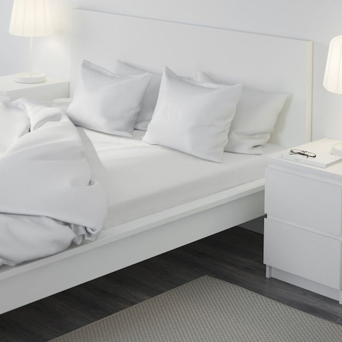 IKEA Fitted sheet white 180x200 cm (71x79 ") on a bed 40499021
