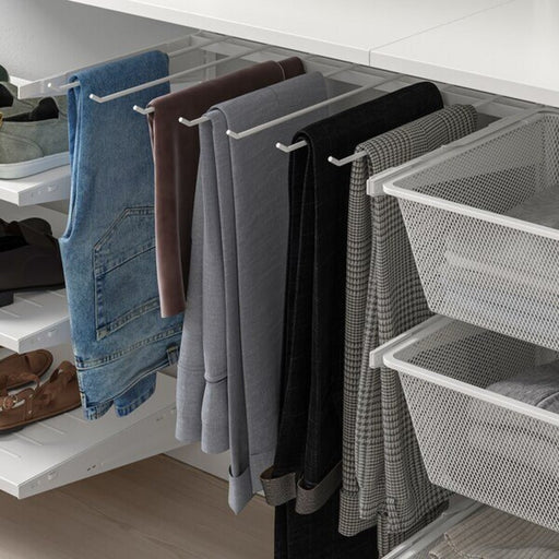 "Closet before and after using IKEA trouser hanger for pants organization".