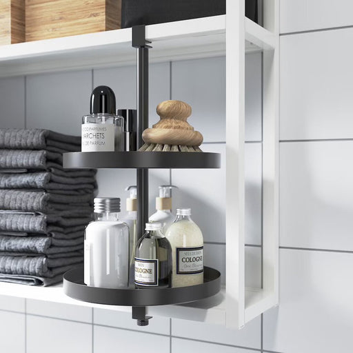 The IKEA Anthracite Swivel Shelf in use, demonstrating its versatility as a storage solution for a range of household items.