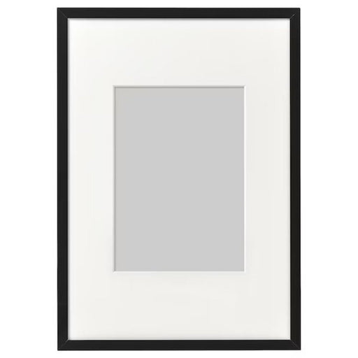 A sleek photo frame with a white mat, perfect for displaying your favorite memories  90286772