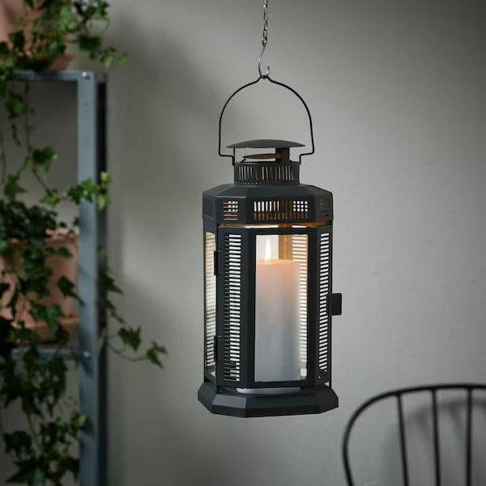 An indoor IKEA lantern with a handle, ideal for adding a decorative touch to your home decor.