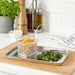 Crispy golden french fries in a rectangular wire mesh serving basket 40516860  