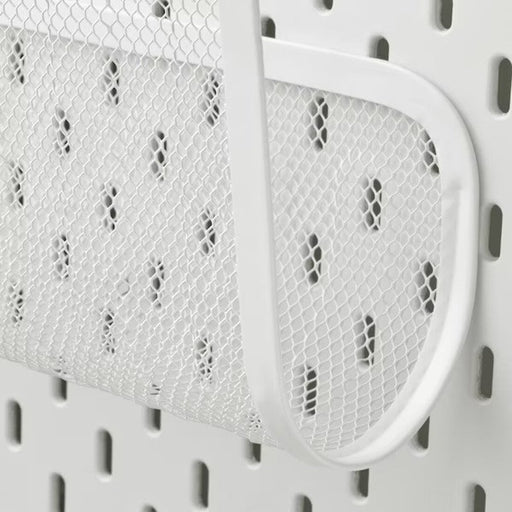 White magazine holder from IKEA displayed with other modern decor. 50519882