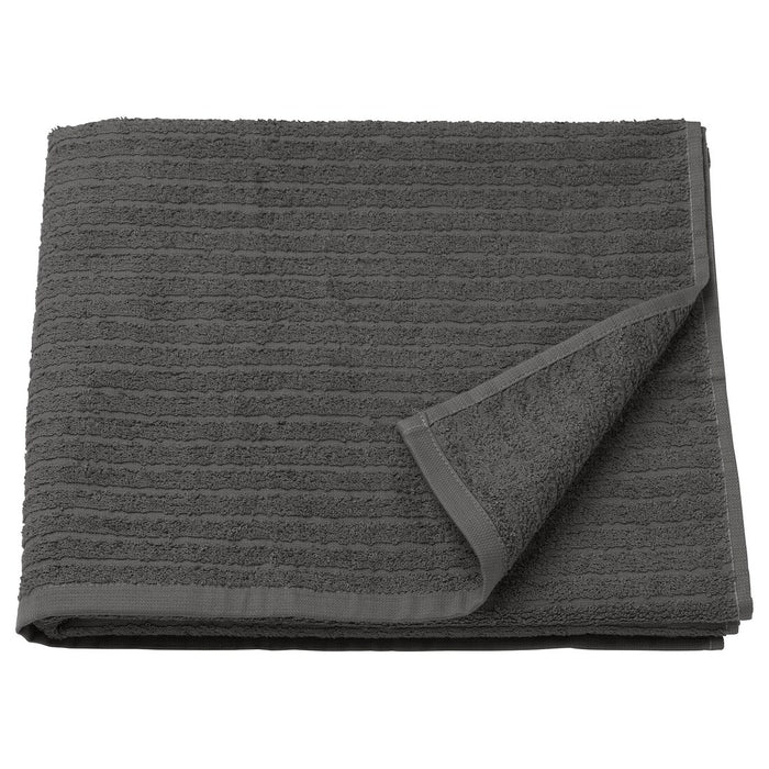 A folded  IKEA bath towel with a decorative pattern