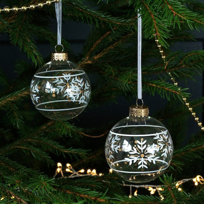 IKEA's Clear Glass Bauble Decoration hanging on a Christmas tree, creating a stunning and sophisticated display 10498952