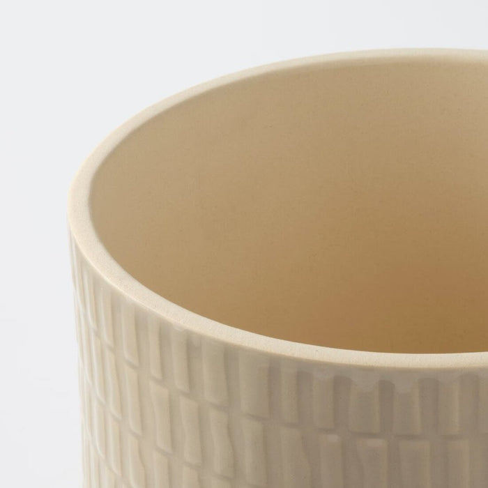 A minimalist plant pot with a matte finish and a clean, modern design. 80505435