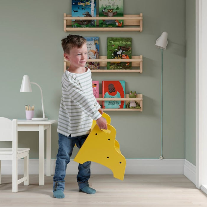 IKEA children's step stool with anti-slip pads on the steps and a handle at the top for easy carrying.