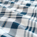 A closeup image of a Dark White/Blue duvet cover with a check pattern  30466441