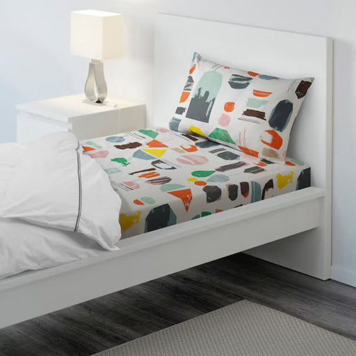 White cotton flat sheet and pillowcase from IKEA on a bed  20426021