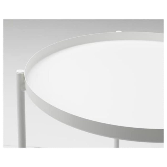 Digital Shoppy IKEA Tray table, white, 45x53 cm (17 1/2x20 5/8 "), A white tray table in a cozy reading nook, featuring a cup of tea and a book on its surface, creating a relaxing atmosphere.  50337820