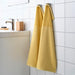 A classic Yellow hand towel with a simple and elegant border design, perfect for any bathroom 70442882