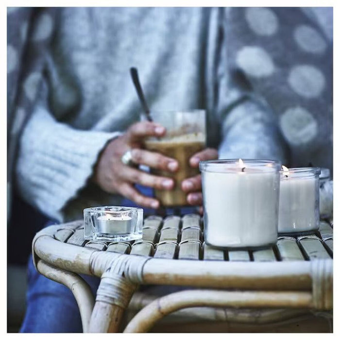 IKEA Glass Jar Candle with Inviting Fragrance: A long-lasting and aromatic candle designed to create a cozy and welcoming atmosphere in any space.