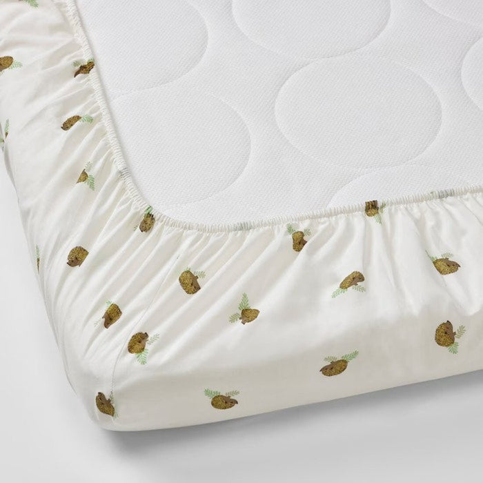 A close-up photo of an IKEA fitted sheet in white with elastic edges to fit snugly over a mattress , 80514388
