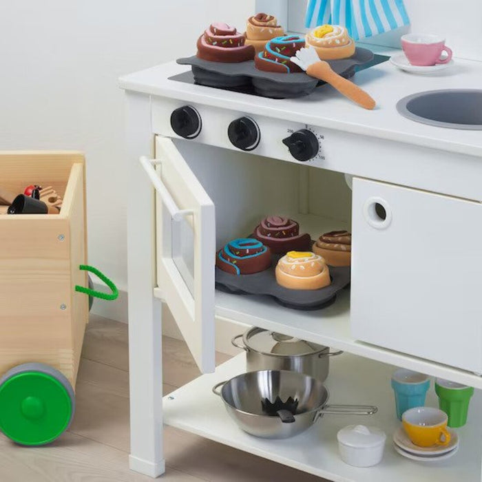 IKEA's 6-piece roll set in use in a small apartment kitchen, showing how it maximizes storage in a limited space