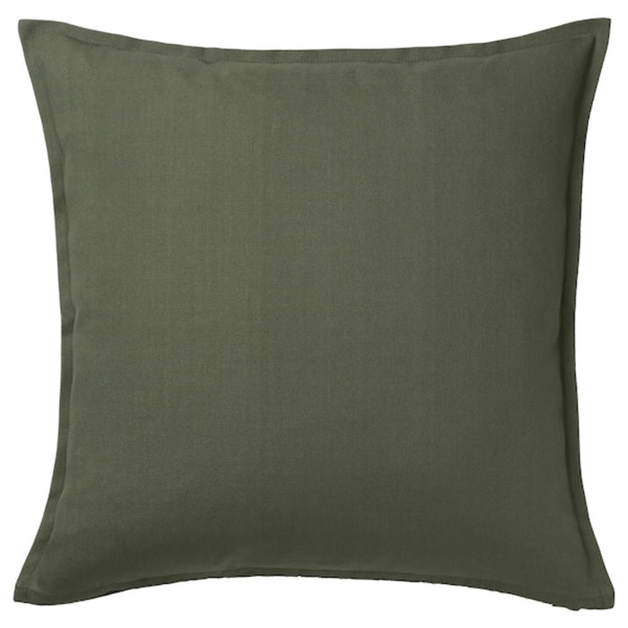 A photo of an Ikea cushion cover in a deep green color-40489588