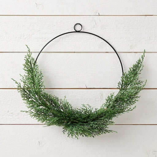 Digital Shoppy An artificial wreath made of realistic-looking cypress leaves, measuring 38 cm in diameter, from IKEA.  10496552