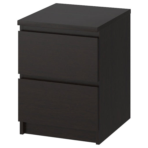 An IKEA chest of drawers made of light wood with two drawers and a clean, minimalist design.