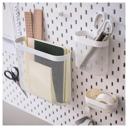 White IKEA Storage baskets set of 3, hanging on an IKEA pegboard, holding various items. 10517762