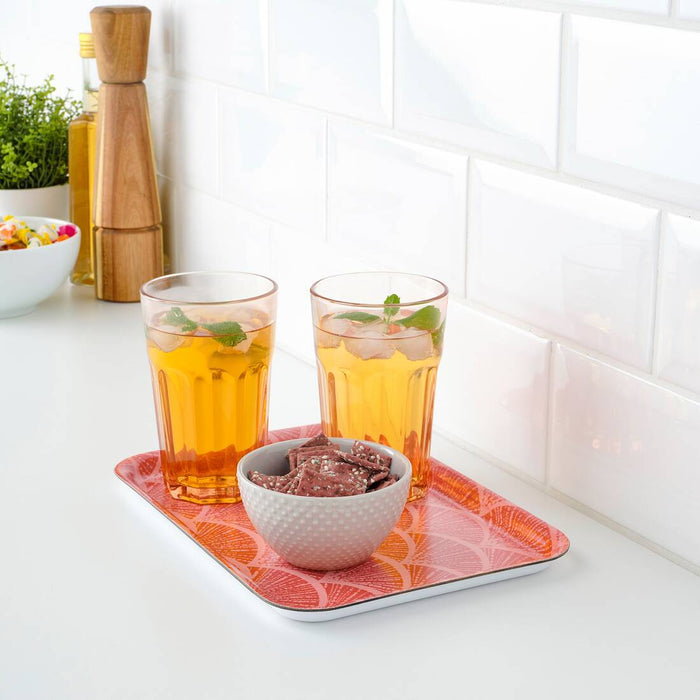 A rectangular serving tray with curved edges, holding a pitcher and glasses on its surface. 10481211