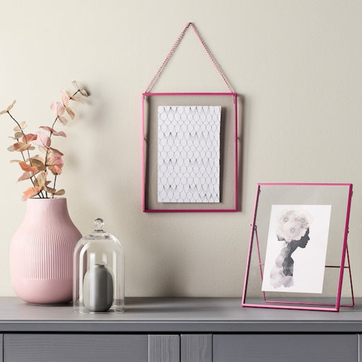 A collage photo frame that allows you to display multiple photos at once, creating a unique and personalized display 00412096