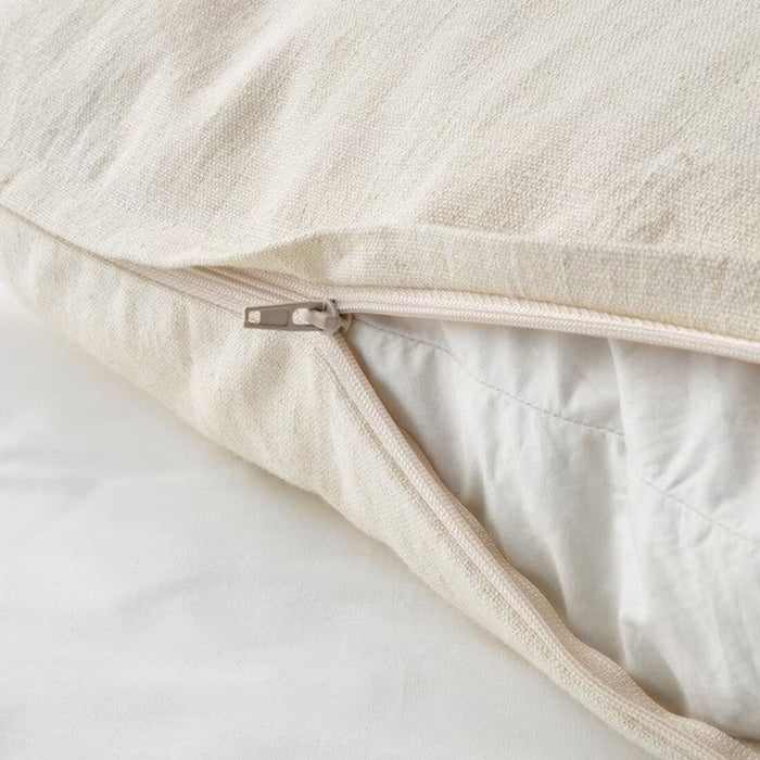 A soft, white IKEA cushion cover with a natural, plain, and hidden zipper closure-40456540