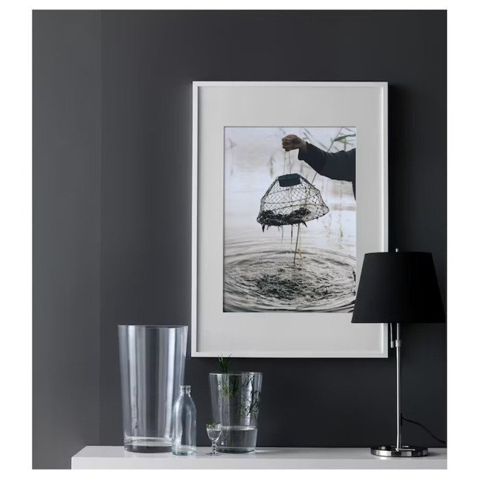 IKEA frame with natural wood finish and glass cover for 50x70cm pictures 80268877