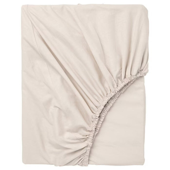 An IKEA fitted sheet in a soft, beige color 30357164   