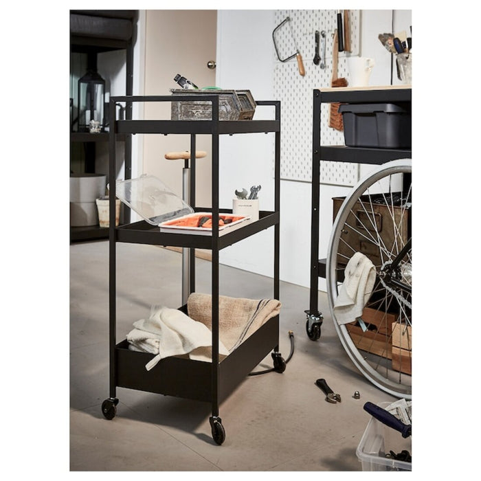 Digital Shoppy An overhead view of the IKEA trolley, showcasing its compact size and ample storage space, as well as its sleek and modern design. , 60407365 , black.