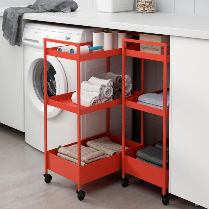 Digital Shoppy A side view of the IKEA trolley, highlighting its durable build and the smooth-rolling wheels that make it easy to move from room to room. (19 7/8x11 3/4x32 5/8 ")  60465746      red