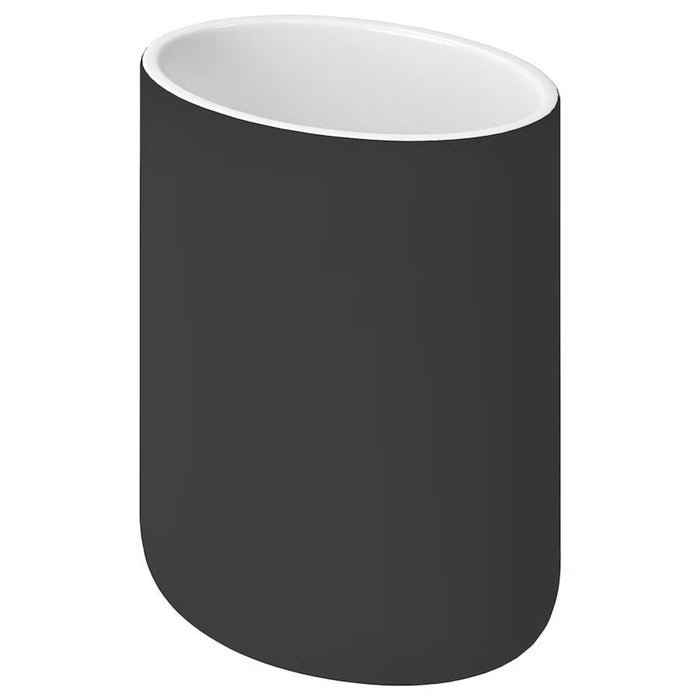 Toothbrush holder: A dark grey toothbrush holder with four slots to hold toothbrushes.