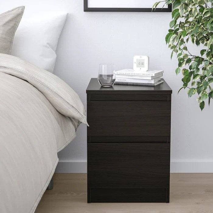 Compact and space-saving IKEA Chest of 2 Drawers, ideal for small bedrooms or living areas.