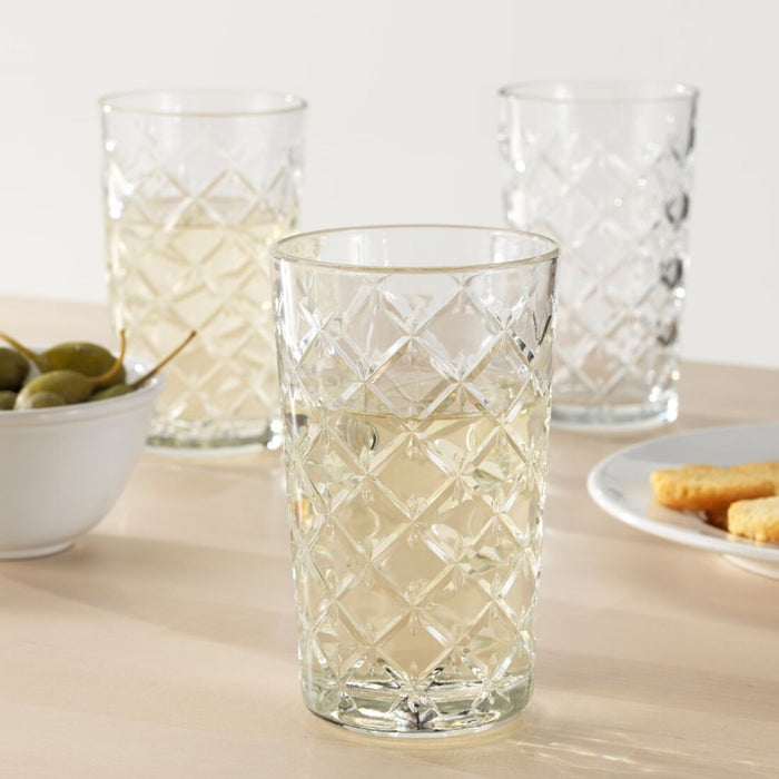 A set of clear and patterned glass tumblers from IKEA, with a versatile design perfect for any drink.