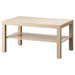 An IKEA coffee table with a wooden top ideal for a cozy living room.