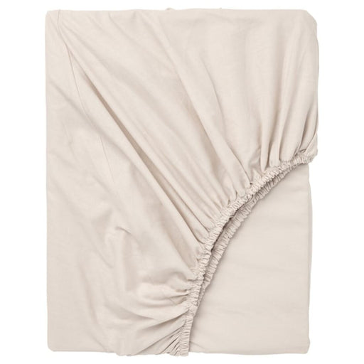 An IKEA fitted sheet in a soft, beige color  50357224