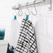 A striped cotton tea towel with fringed edges 00342980