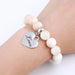 A charm bracelet with various shaped and sized charms-White & Beige (SL704)