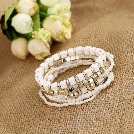 "A dainty gold bracelet with a small diamond charm"-Gold & white  (SL256)