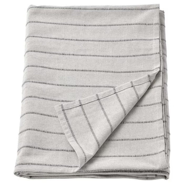 A stylish and versatile IKEA bedspread, measuring 230x250 cm
