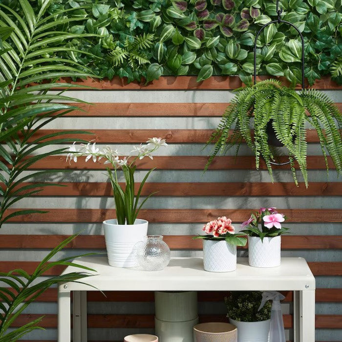 Looking for a stylish and functional way to add some greenery to your space? Look no further than IKEA's artificial wall mounted plant, measuring 26x26 cm, perfect for elevating your decor