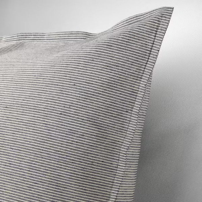 A close-up image of the soft and durable White/dark grey cushion cover from IKEA  10432659