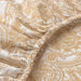 A close-up of an IKEA fitted sheet's elastic edges shows its stretchiness and durability-80549689             