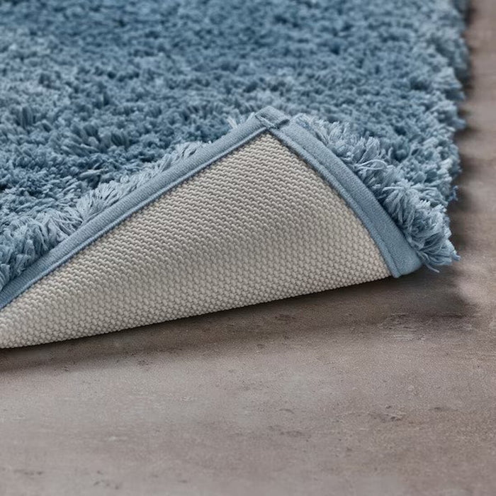 Thick and plush blue IKEA bath mat providing a luxurious and spa-like experience for the feet  40551759 