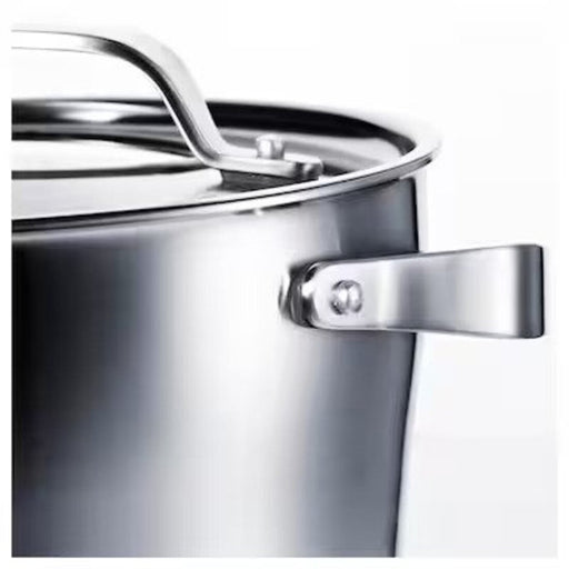 IKEA's stainless steel pot with lid being lifted by a cook, IKEA Pot with Lid, 5.5 L - Spacious and stylish  00324556 