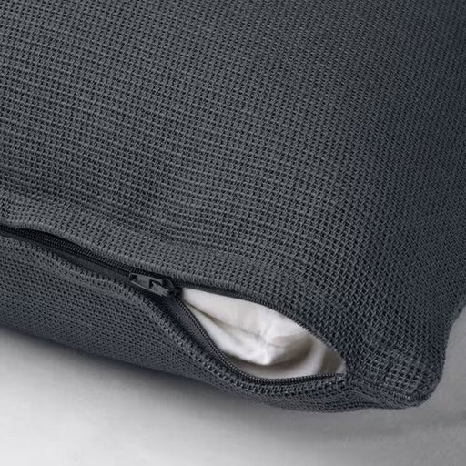  A black-blue cushion cover from IKEA has a hidden zipper that makes the cover easy to remove 40530795