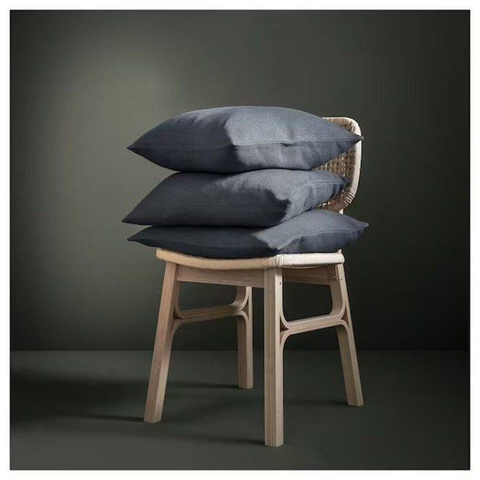 A black-blue cushion cover from IKEA, measuring 50x50 cm, on a stool with matching pillows 40530795